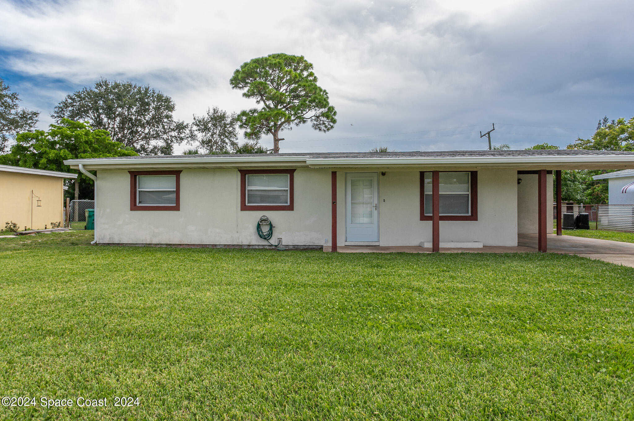 photo 1: 1545 Plum Avenue, Merritt Island FL 32952