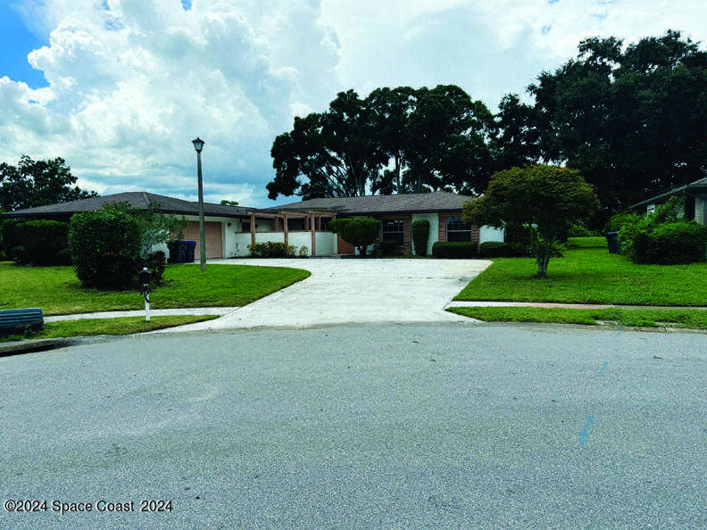 photo 1: 3604 Travis Place, Titusville FL 32780