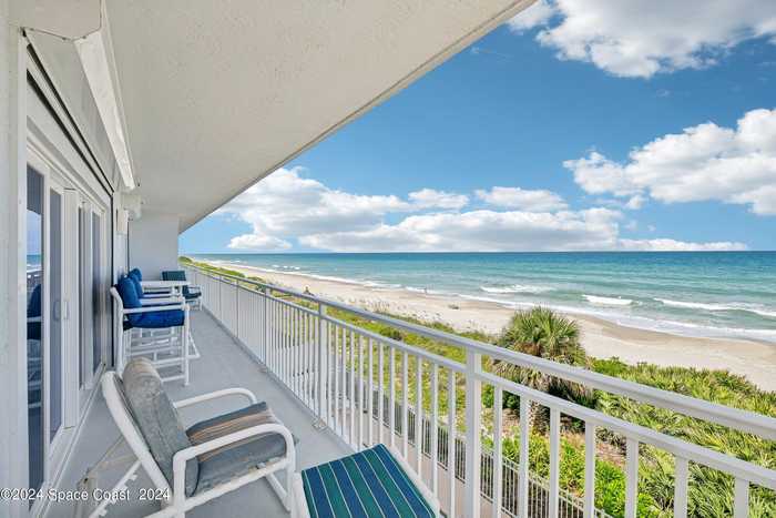 photo 1: 2035 Highway A1a Unit 305, Indian Harbour Beach FL 32937