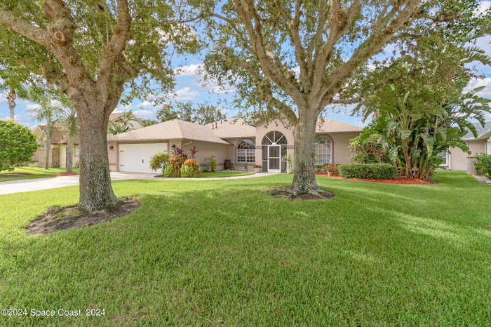 photo 1: 1116 Cypress Trace Drive, Melbourne FL 32940