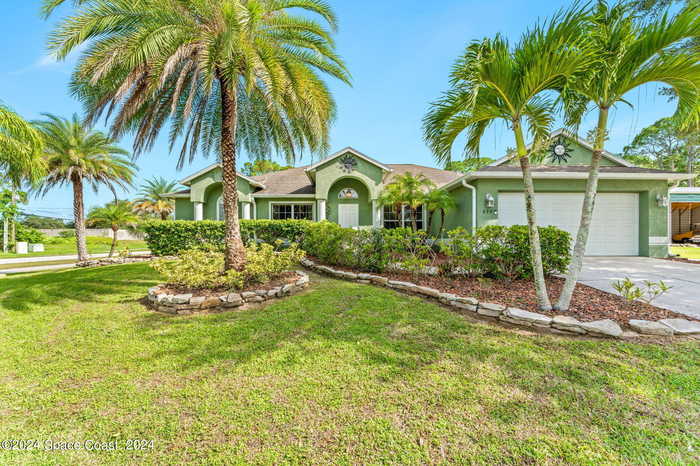 photo 1: 899 Sanford St SW, Palm Bay FL 32908