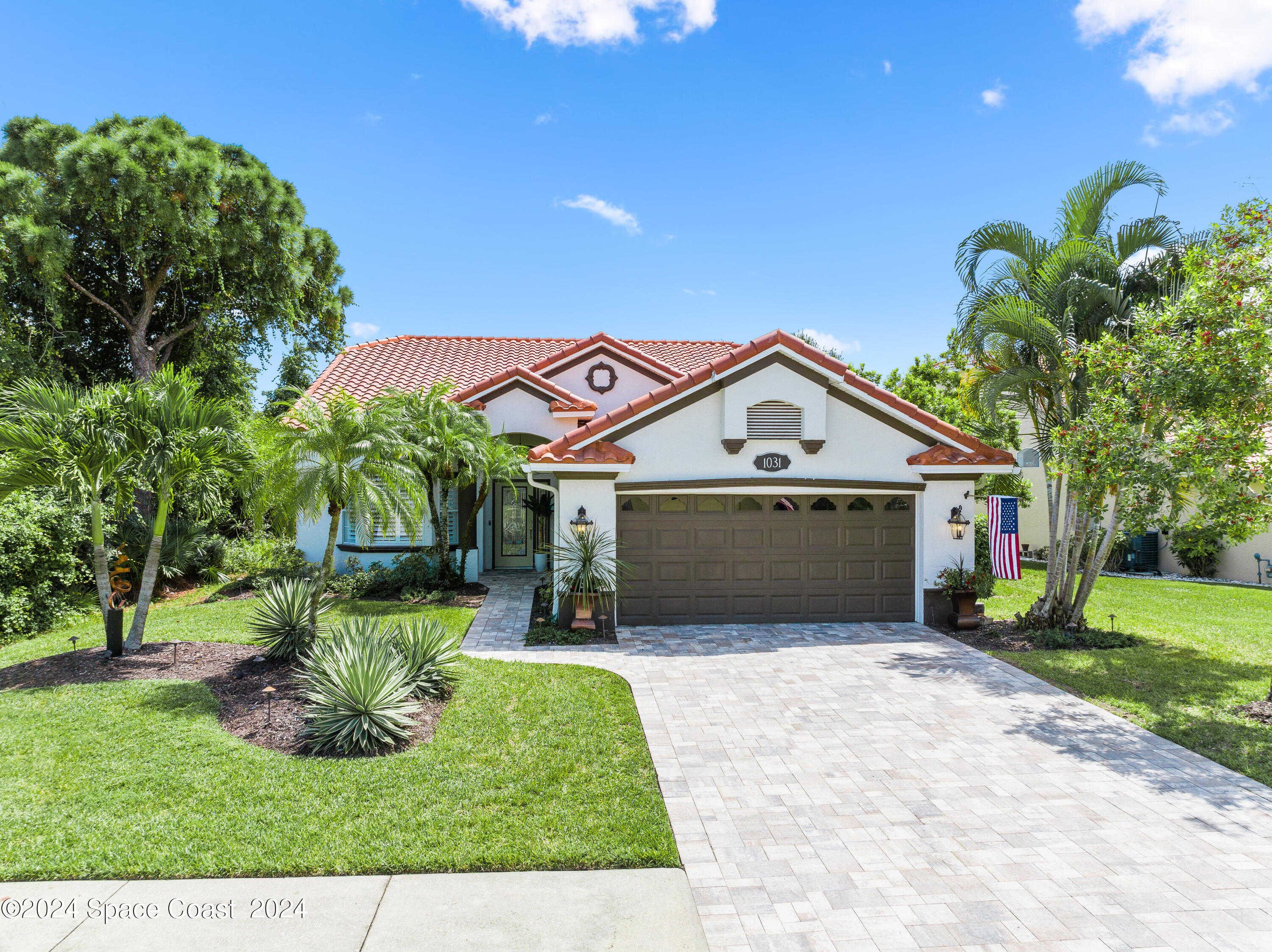 photo 1: 1031 Wimbledon Drive, Melbourne FL 32940