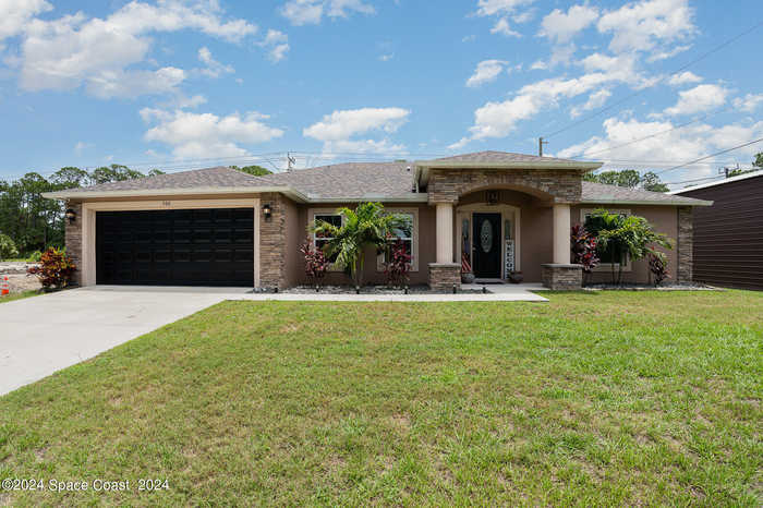 photo 1: 506 Warwick Street SE, Palm Bay FL 32909