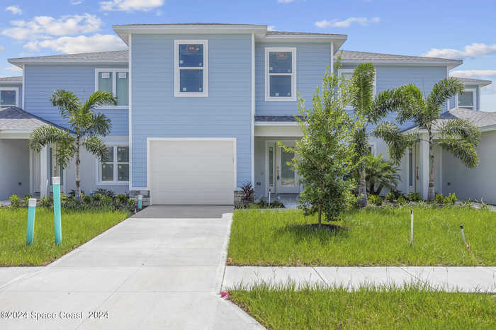 photo 1: 228 Hidden Woods Place, Melbourne FL 32901