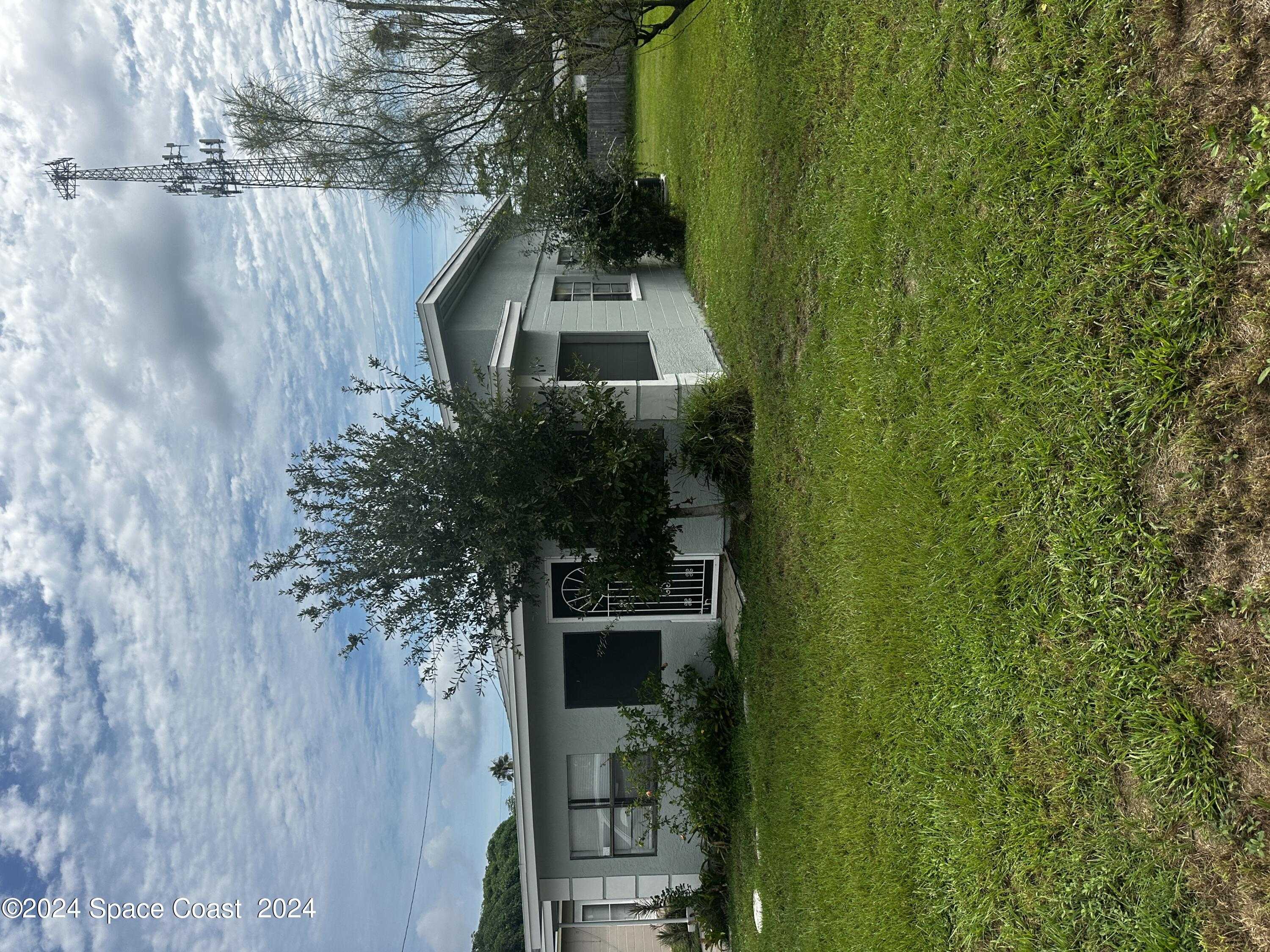 photo 1: 3109 Swift Street, Melbourne FL 32901