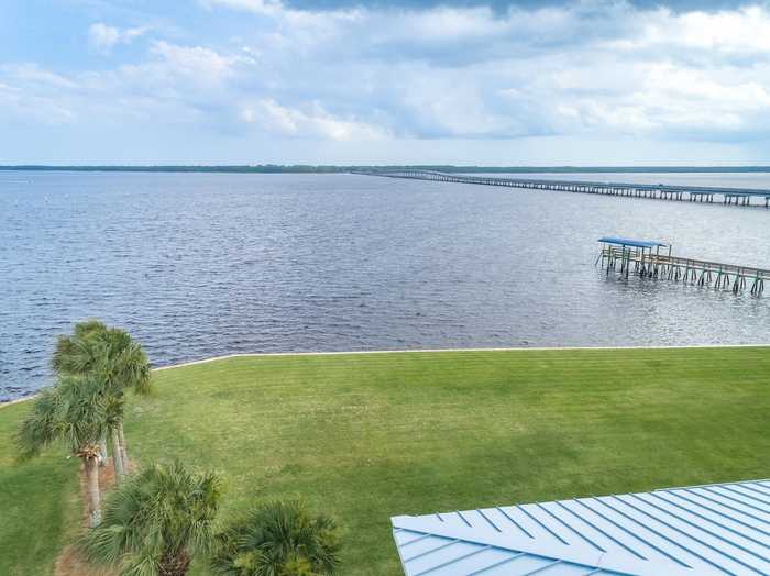 photo 1: 19 Mashes Sands Road, OCHLOCKONEE BAY FL 32346