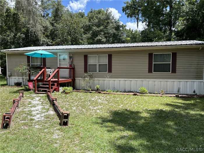 photo 1: 8145 S Kimberly Circle, Floral City FL 34436