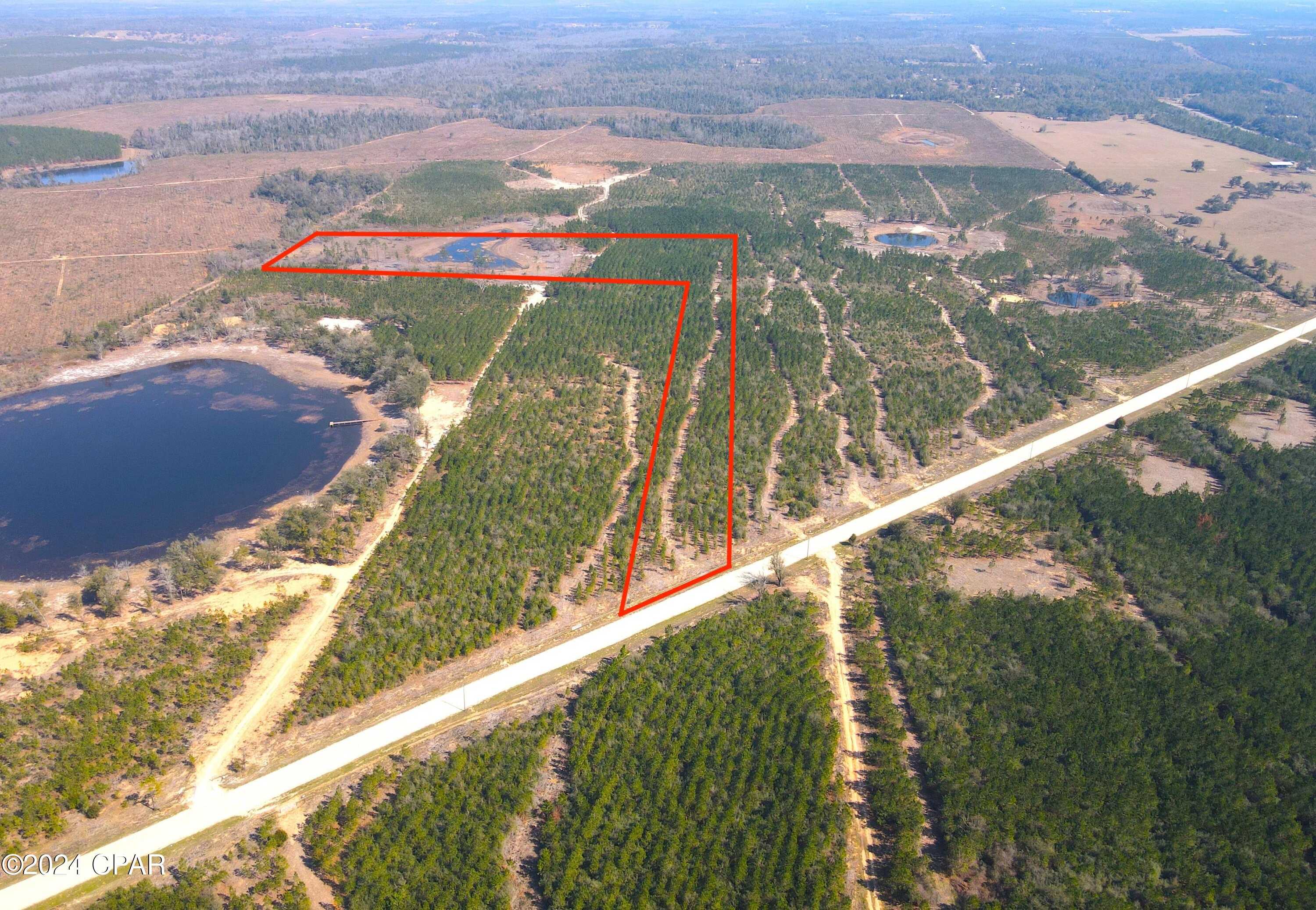 photo 1: NW Camphead Road Unit 32, Altha FL 32421