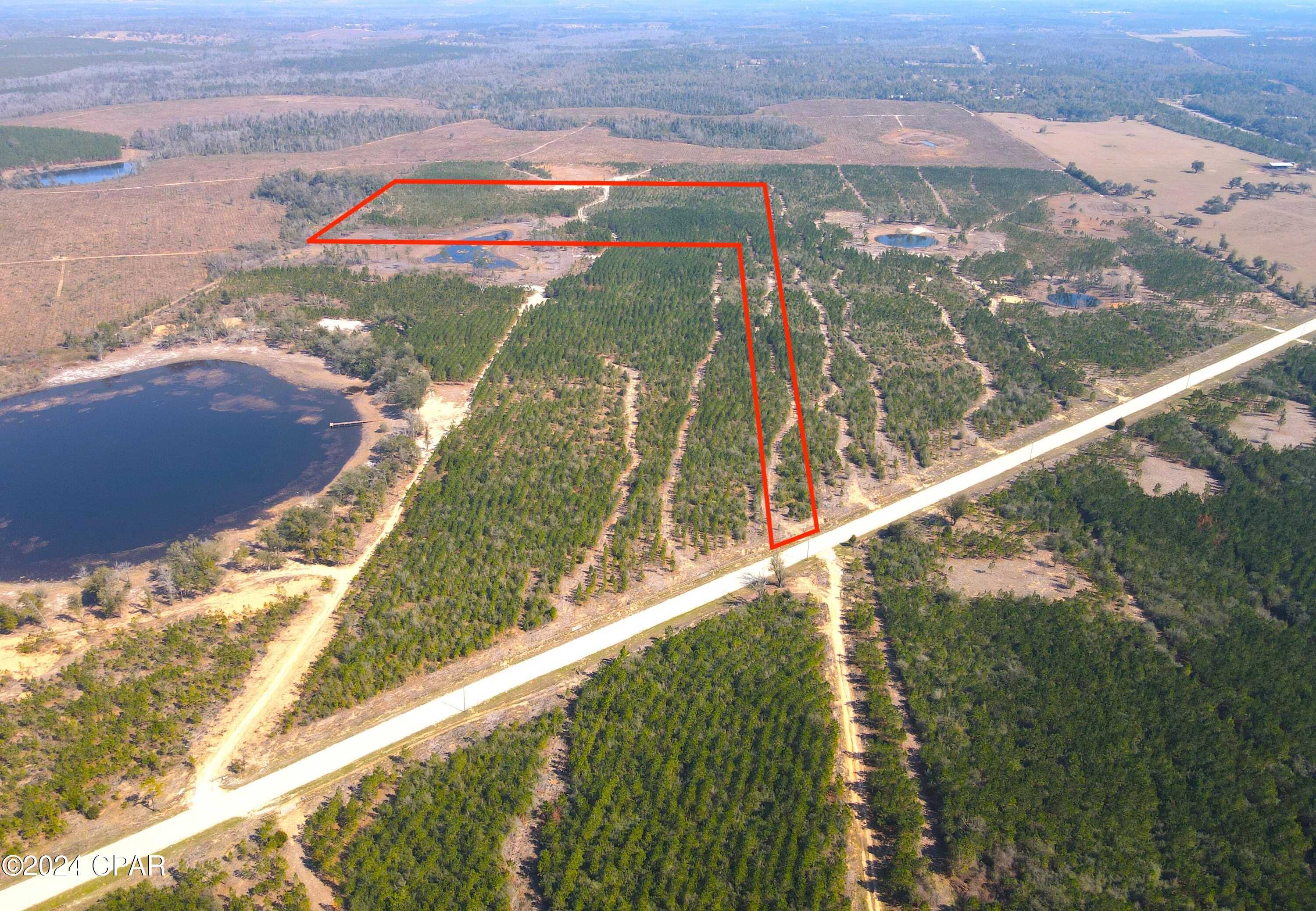 photo 1: NW Camphead Road Unit 33, Altha FL 32421