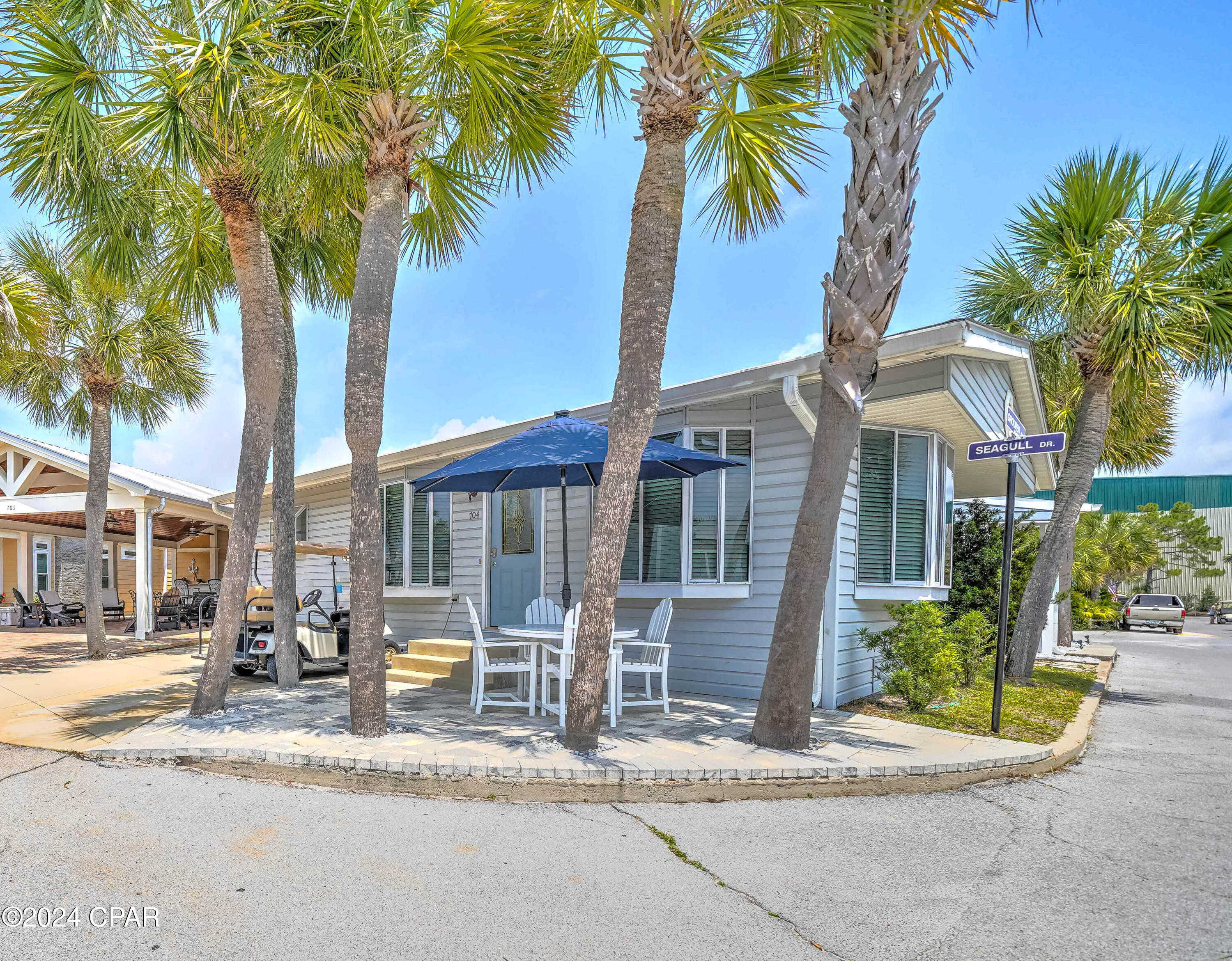 photo 1: 704 Grouper Avenue, Panama City Beach FL 32408