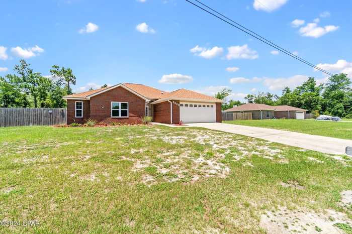 photo 1: 9009 Creek Run Road, Youngstown FL 32466