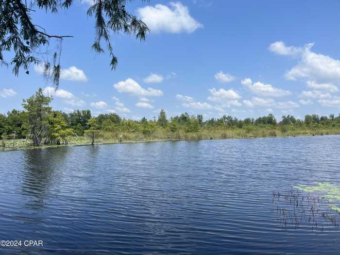 photo 1: 9636 Indian Bluff Resort Ln, Youngstown FL 32466