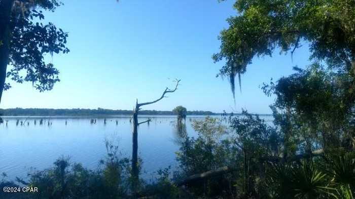 photo 1: 4221 Wood Duck Cove, Southport FL 32409