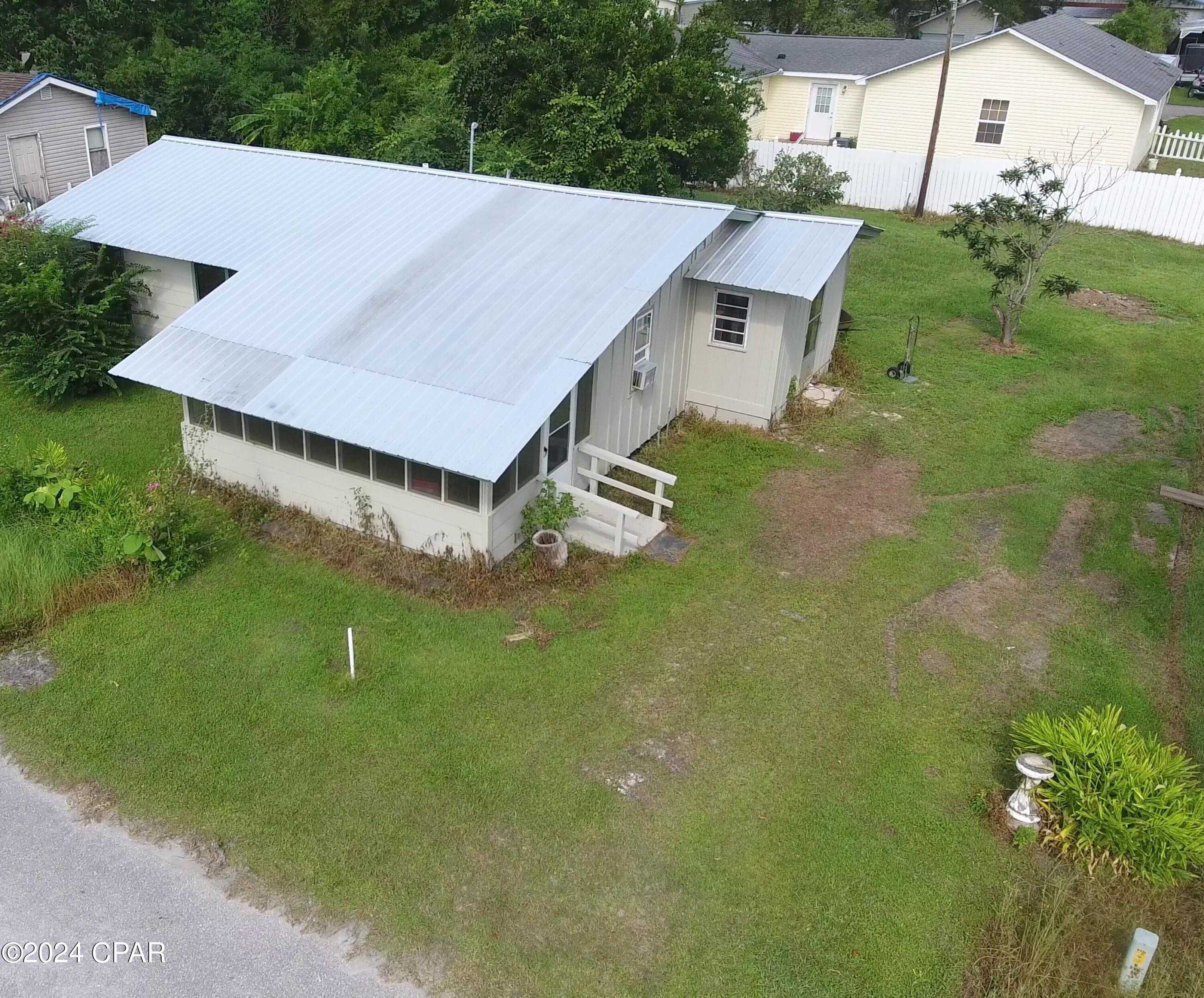 photo 1: 7241 Begonia Street, Wewahitchka FL 32465