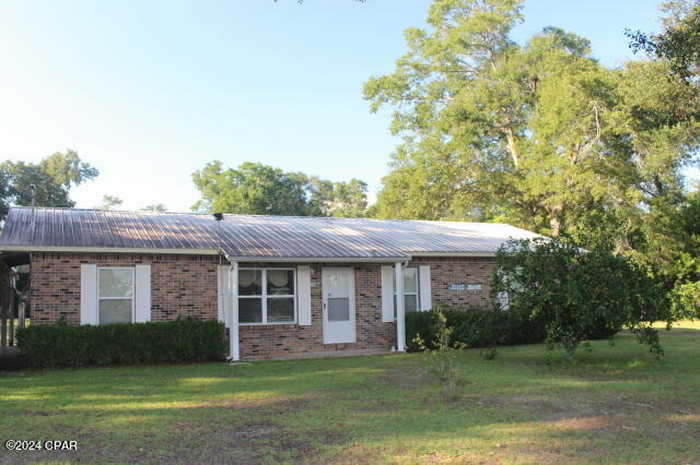 photo 1: 6562 Messer Road, Grand Ridge FL 32442