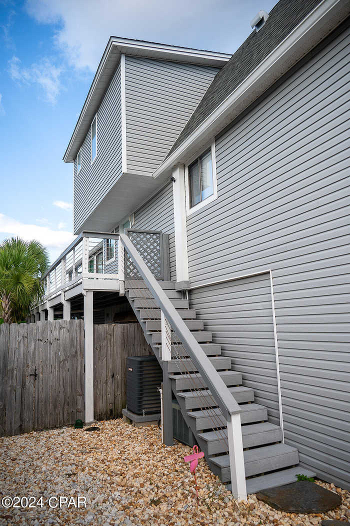 photo 2: 7318 S Lagoon Drive, Panama City Beach FL 32408