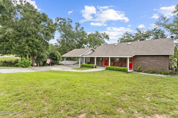 photo 1: 3915 Country Club Boulevard, Chipley FL 32428