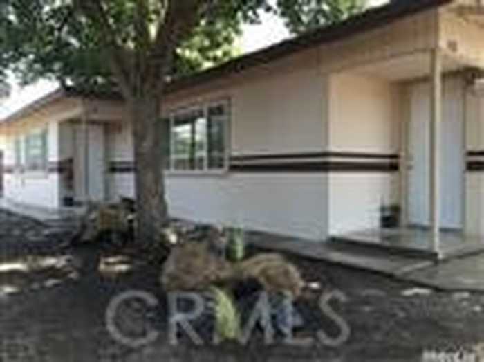 photo 1: 1109 1111 Center Avenue, Dos Palos CA 93620