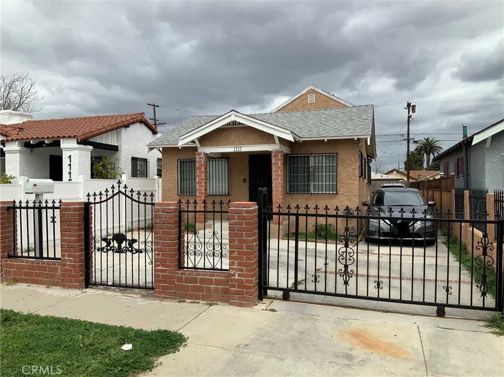 photo 1: 1111 W 104th Street, Los Angeles CA 90044