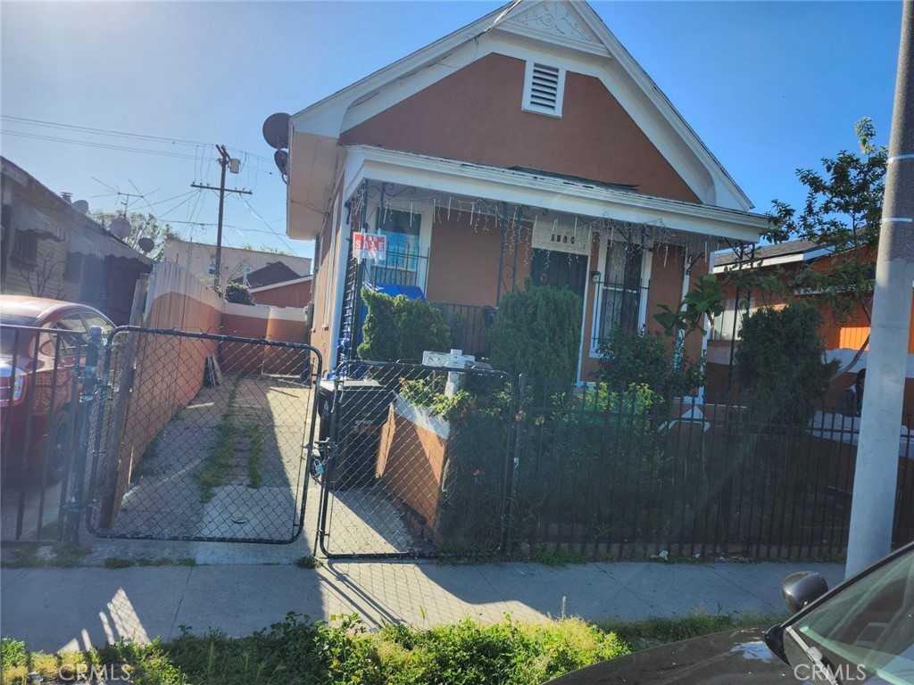 photo 1: 3822 CRAWFORD Street, Los Angeles CA 90011