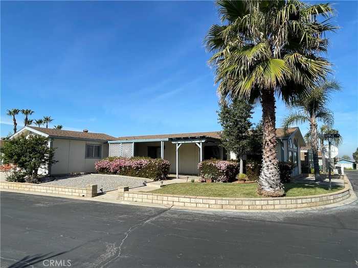 photo 1: 10961 Desert Lawn Drive Unit 105, Calimesa CA 92223