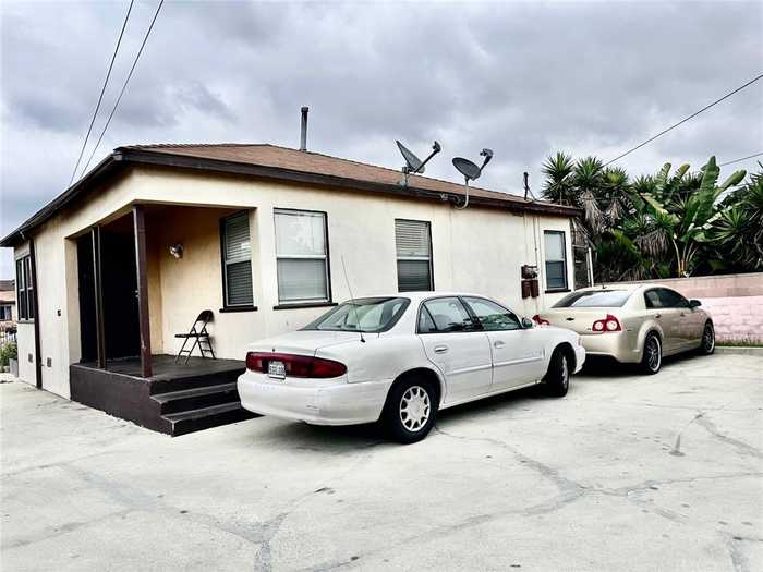 photo 1: 150 W 112th Street, Los Angeles CA 90061