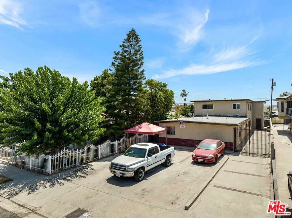 photo 1: 840 W 52nd Street, Los Angeles CA 90037