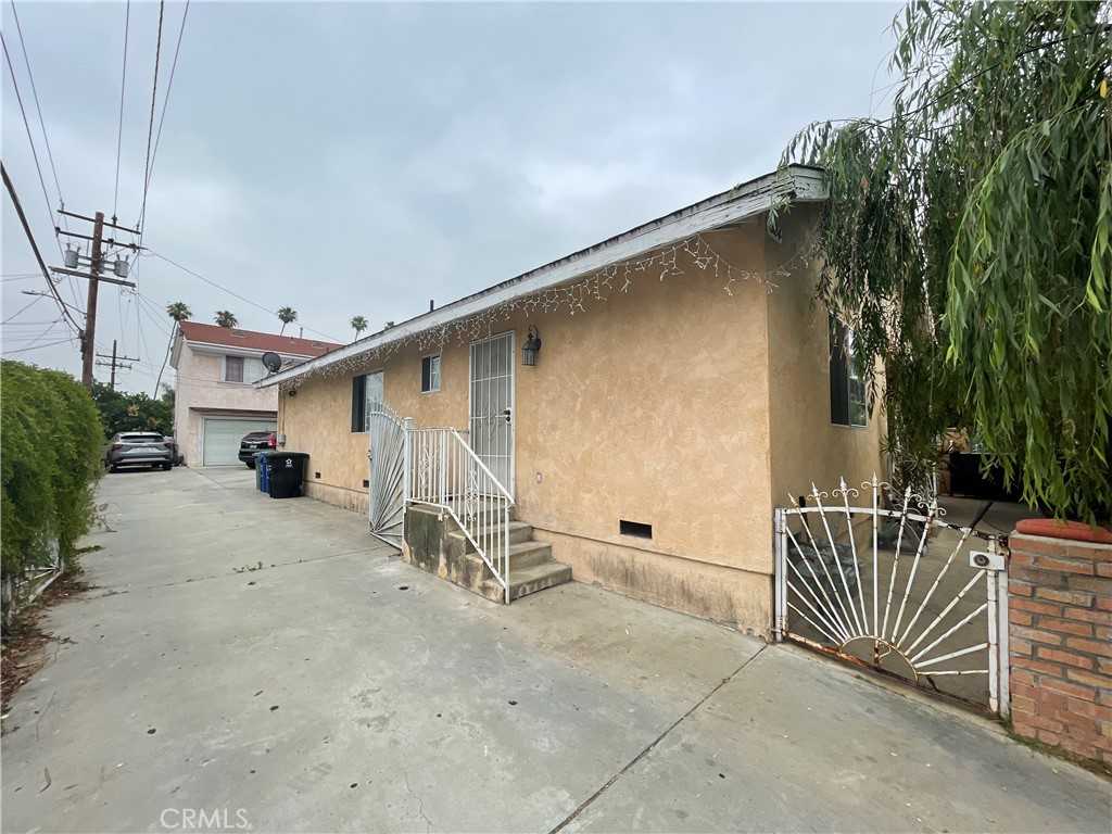 photo 1: 322 N Ditman Avenue, Los Angeles CA 90063