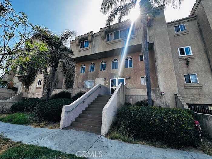 photo 1: 6100 Rugby Avenue Unit 105, Huntington Park CA 90255