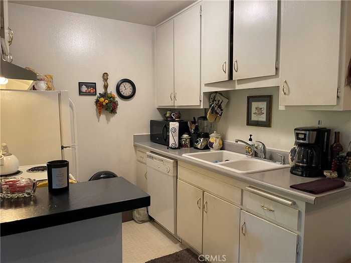 photo 2: 436 N Bellflower Boulevard Unit 103, Long Beach CA 90814