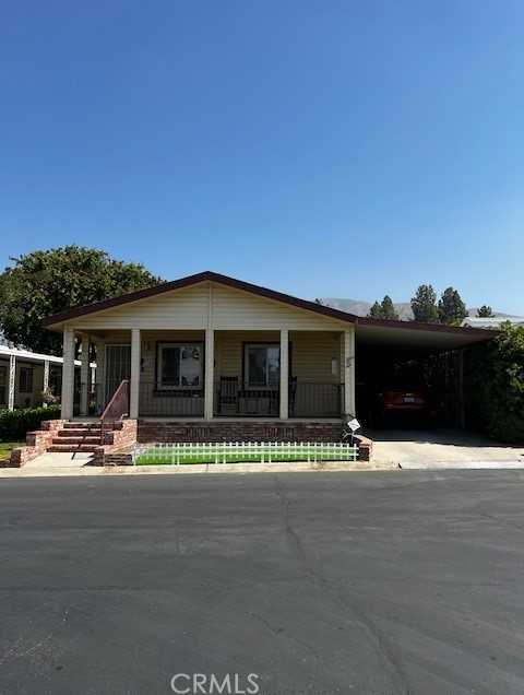 photo 1: 3850 Atlantic Avenue Unit 89, Highland CA 92346