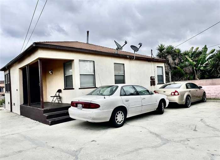 photo 1: 150 W 112th Street, Los Angeles CA 90061