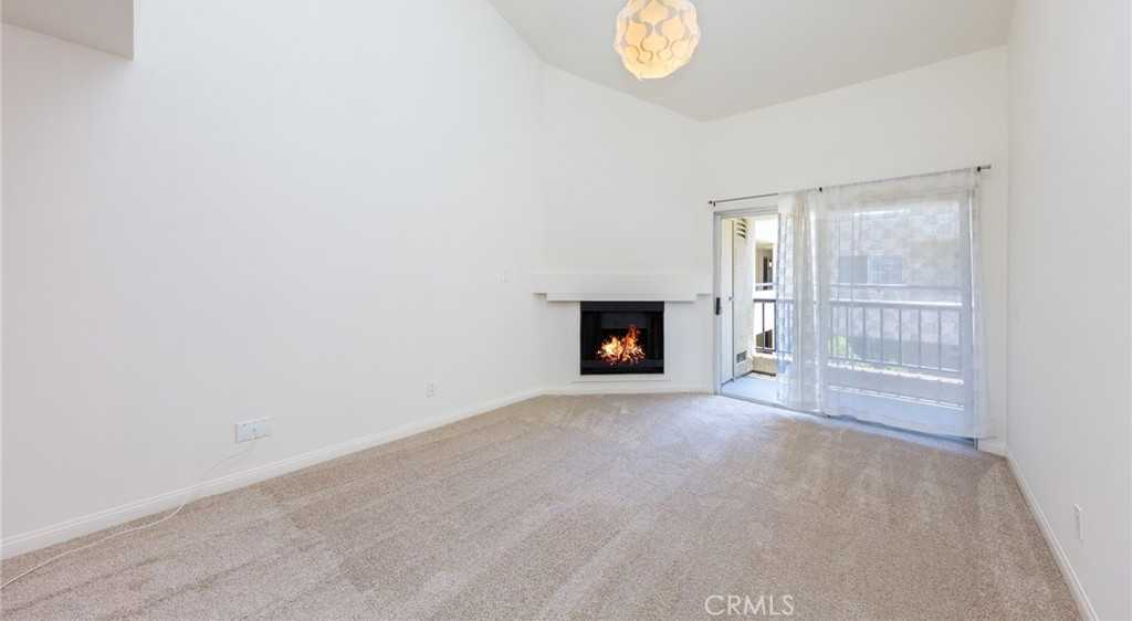 photo 1: 21400 Burbank Boulevard Unit 311, Woodland Hills CA 91367