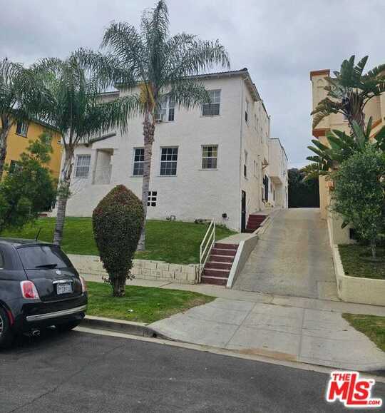 photo 3: 1331 S Mansfield Avenue, Los Angeles CA 90019