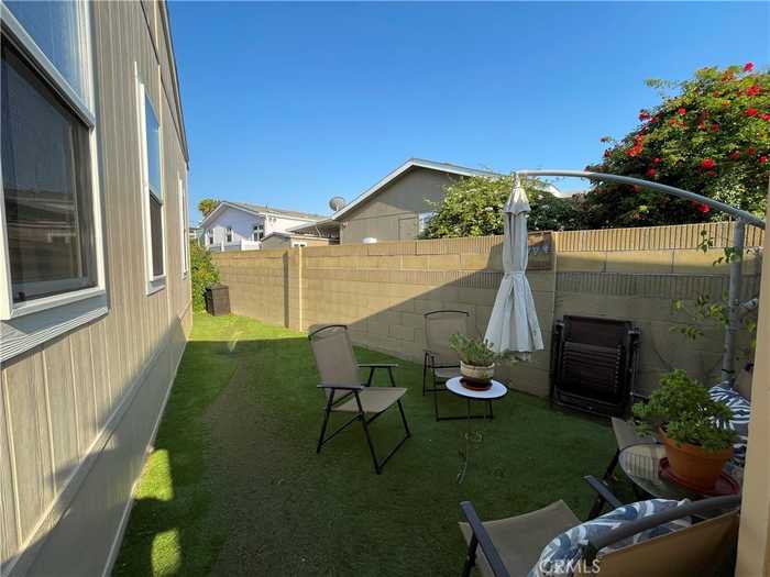 photo 2: 16222 Monterey Unit 109, Huntington Beach CA 92649