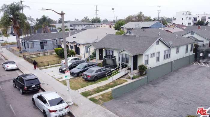 photo 1: 1045 W Vernon Avenue, Los Angeles CA 90037