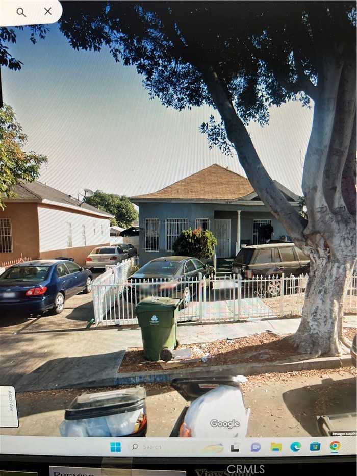 photo 1: 1201 E 56th Street, Los Angeles CA 90011