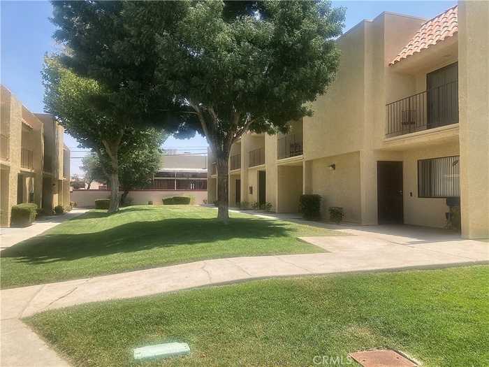 photo 1: 44200 Kingtree Avenue Unit 21, Lancaster CA 93534