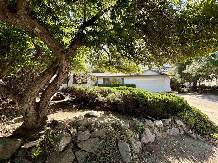 photo 1: 1040 Deerhaven Drive, Vista CA 92084