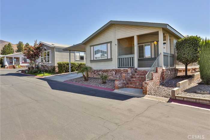 photo 1: 3850 Atlantic Avenue Unit 37, Highland CA 92346