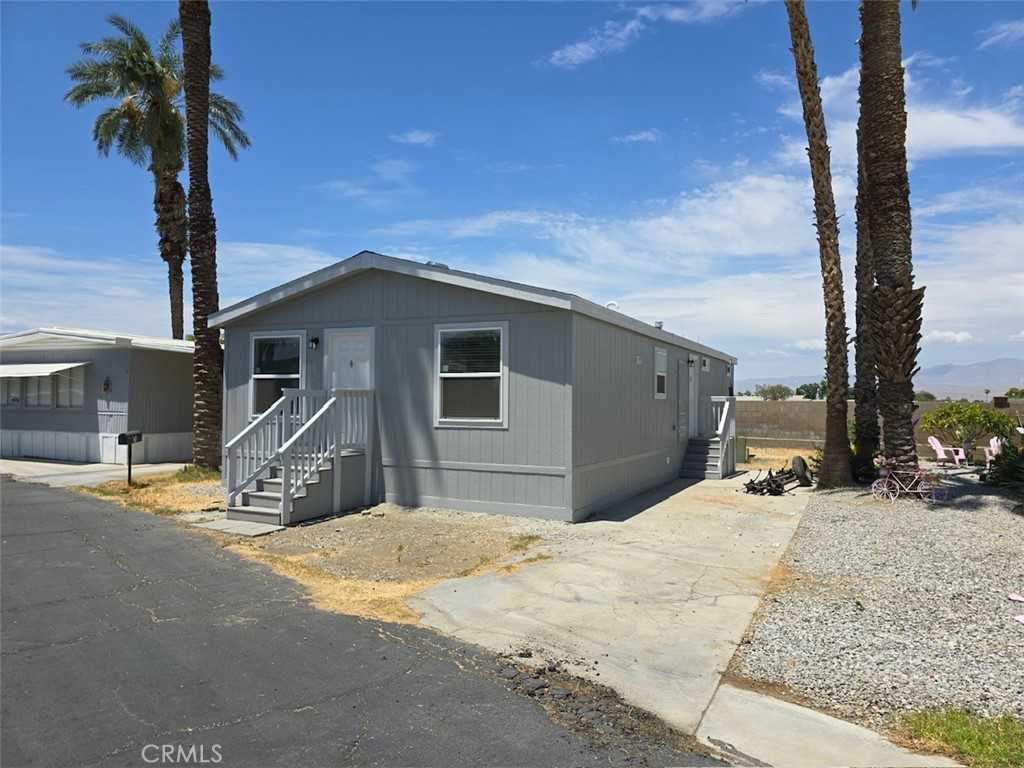 photo 1: 80870 Highway 111 Unit 157, Indio CA 92210