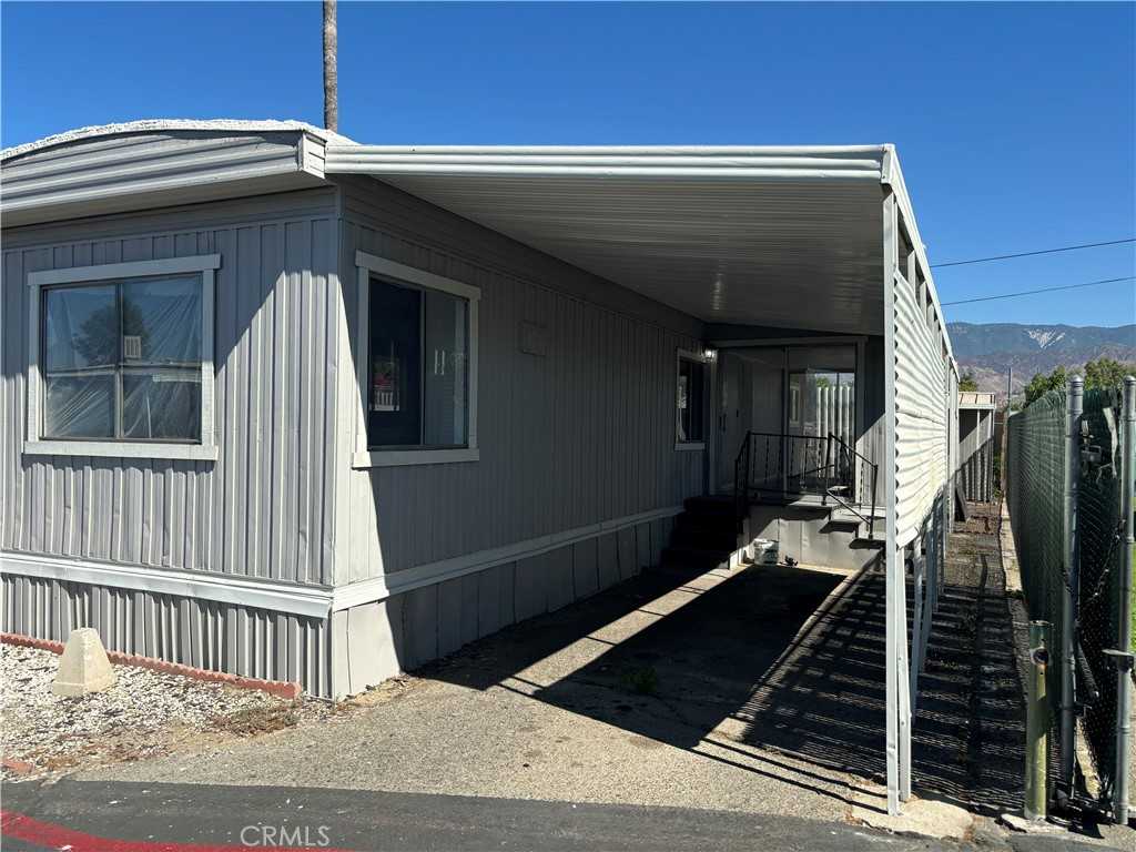 photo 3: 26250 9th. Steet Unit 126, Highland CA 92346