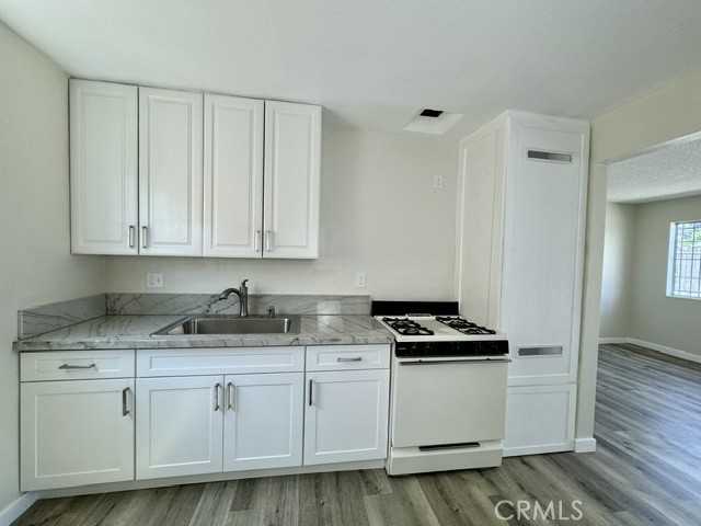 photo 3: 8315 Miramonte Boulevard, Los Angeles CA 90001