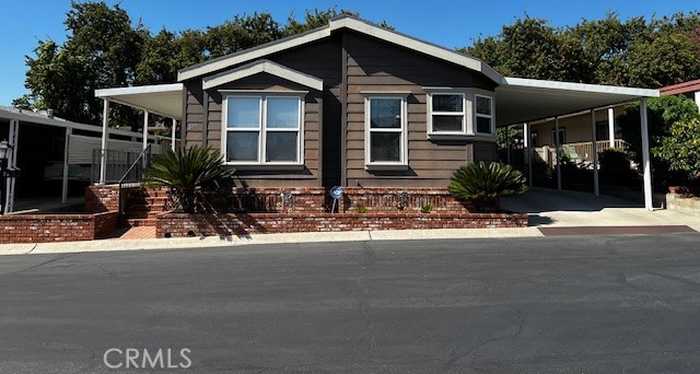 photo 1: 3850 Atlantic Avenue Unit 86, Highland CA 92346