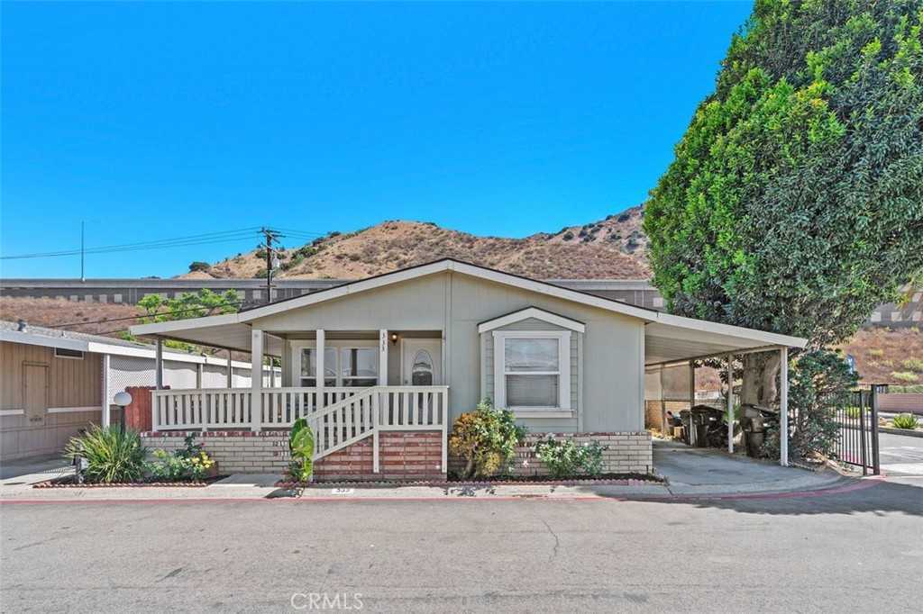 photo 1: 4901 Green River Road Unit 333, Corona CA 92878