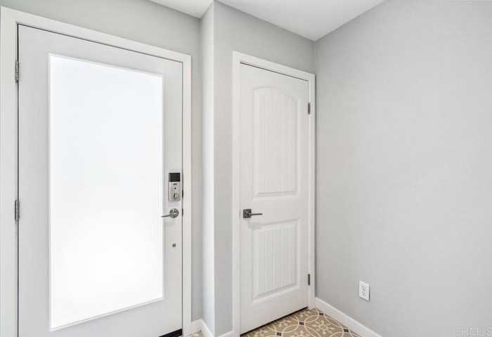 photo 2: 13480 Lopelia Meadows Place Unit 104, San Diego CA 92130