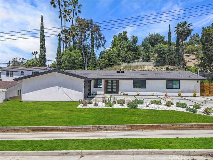 photo 1: 20823 Collins Street, Woodland Hills CA 91367