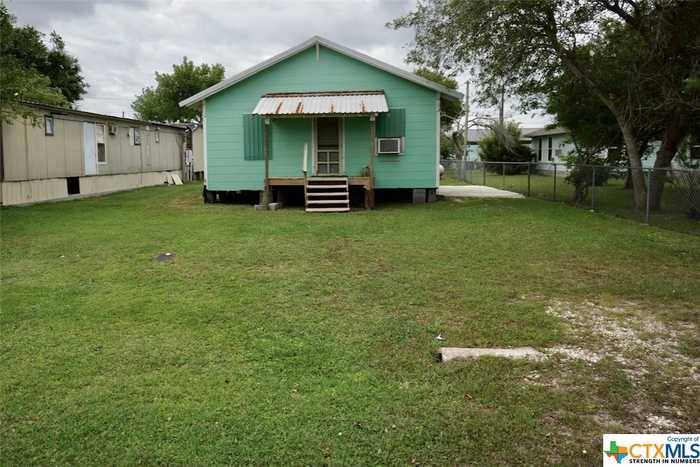 photo 1: 1107 W Jackson Ave Avenue, Port O'Connor TX 77982