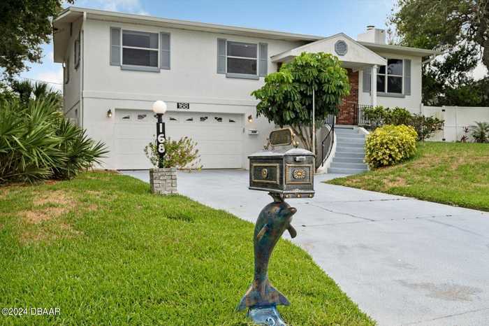 photo 1: 168 Royal Dunes Boulevard, Ormond Beach FL 32176