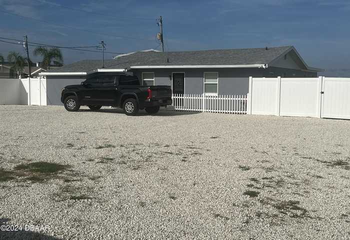 photo 1: 3330 S Peninsula Drive, Port Orange FL 32127